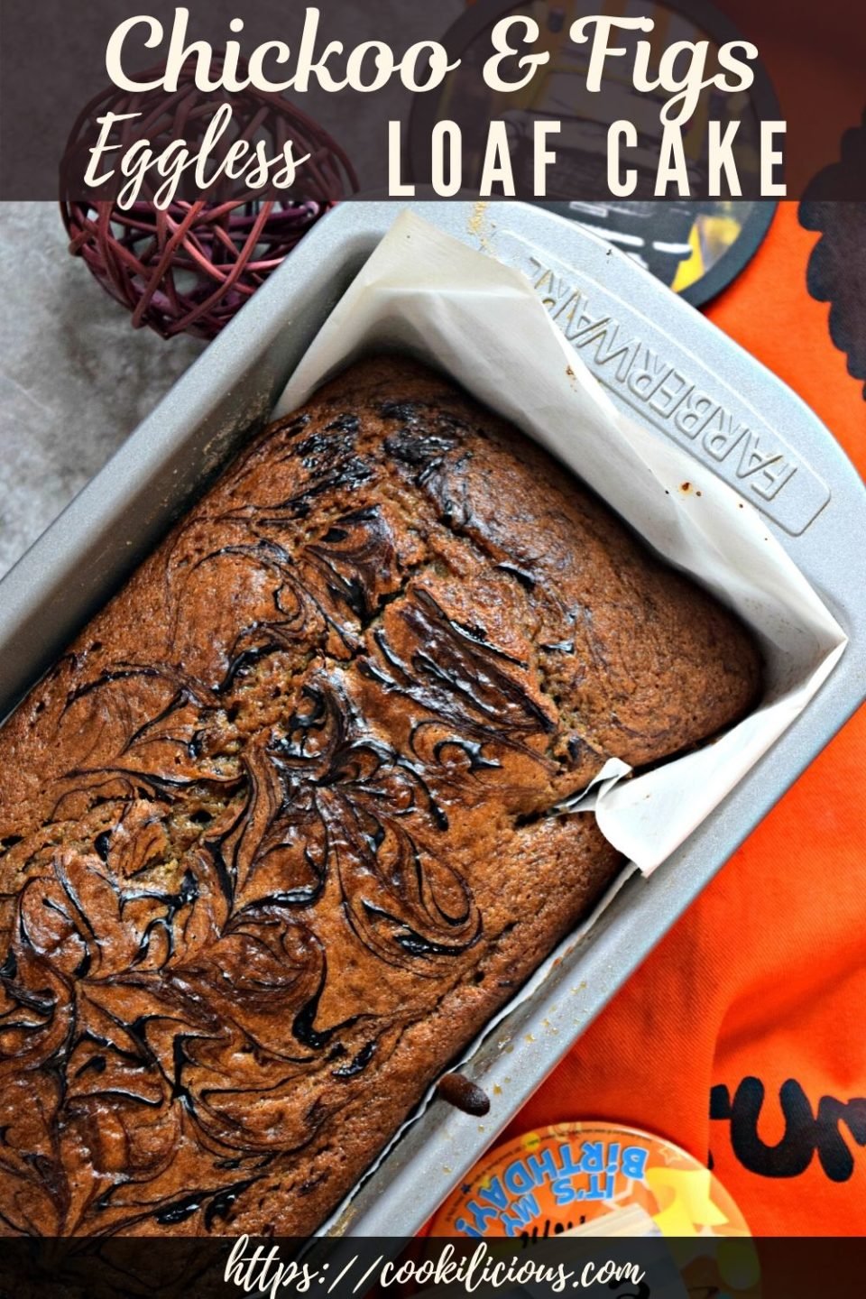 Eggless Chickoo Fig Loaf Cake freshly baked out of the oven with text at the top and bottom