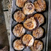 a box filled with Chocolate Coconut Macaroons.