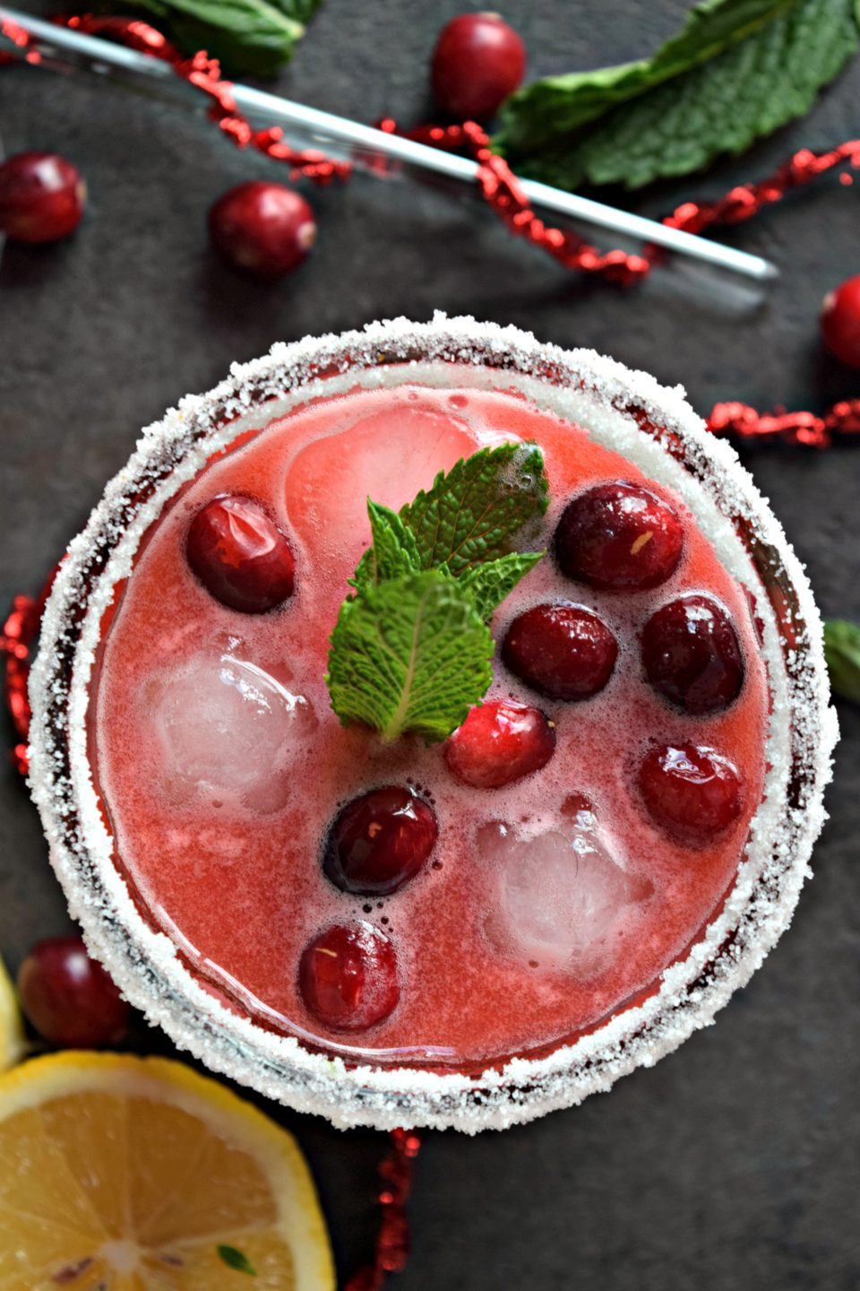 Amortentia in a glass with floating cherries on top