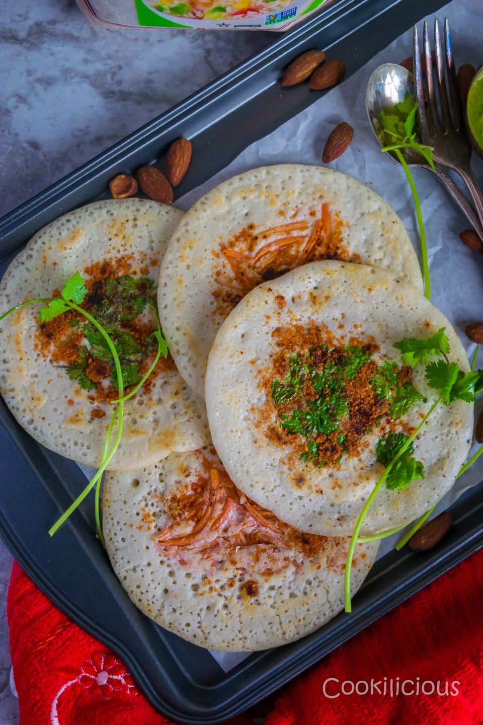 top shot of 4 uttapam made from dosa batter