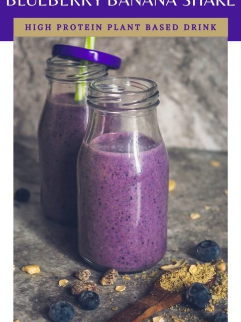 close up image of 2 glasses of Vegan Blueberry Pancake Almond Milk Smoothie placed one behind the other, and text at the top