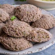 close up shot of Ragi & Kale Idli in a plate