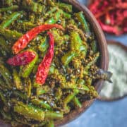 extreme close up shot of Sesame Flavored Green Beans Stir Fry in a wooden bowl