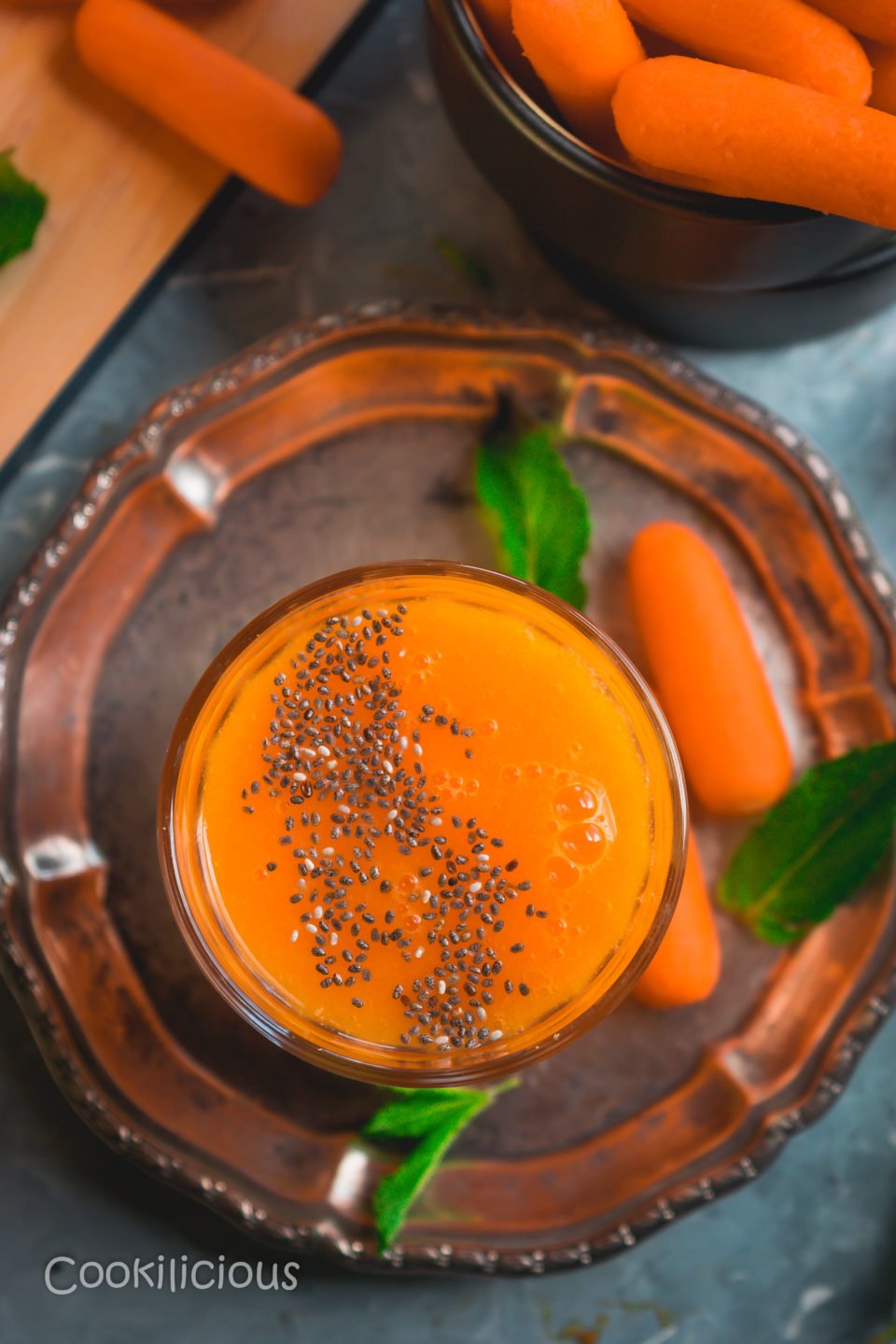 top angle shot of Immune Boosting Sunshine Smoothie in a glass with chia seeds on top