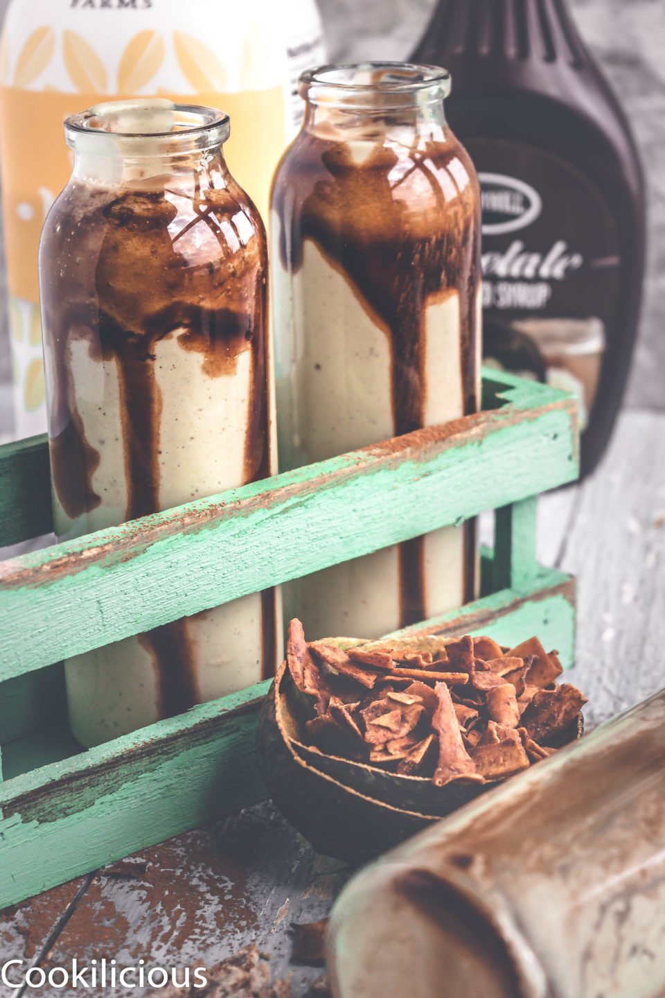 2 bottles filled with Chocolate Avocado Smoothie