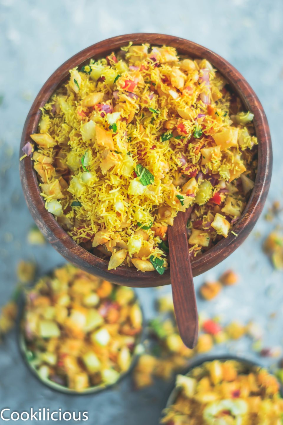 a bowl filled with 2 bowls containing Crispy & Masaledar Cheeselings Bhel 