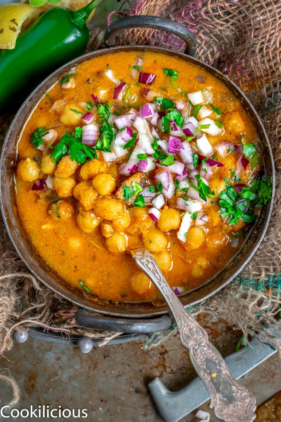 close up shot of South Indian Chickpeas Curry | Chettinad Kondai Kadalai Kuzhambu in a kadai