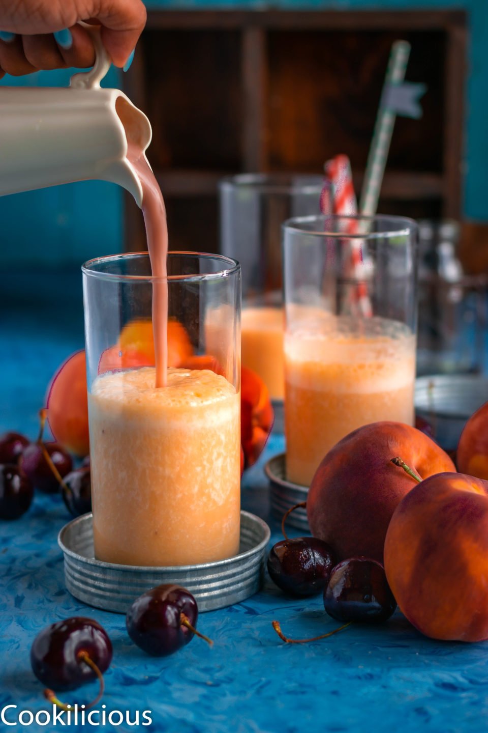 pouring shot of Peach & Raspberry Creamsicle Smoothie