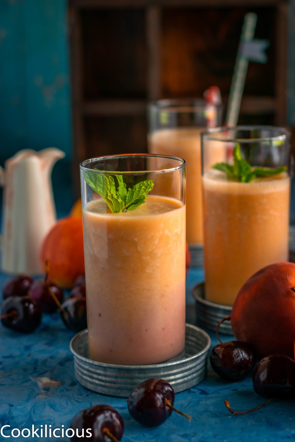 Peach & Raspberry Creamsicle Vegan Smoothie in a tall glass