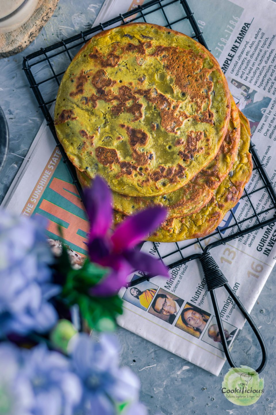 top view of Lentil Pancakes with Leftover Dal over a wire rack