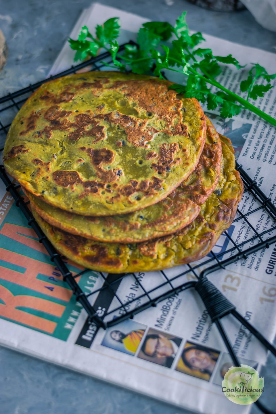 close up shot of Lentil Pancakes with Leftover Dal placed one on top of the other