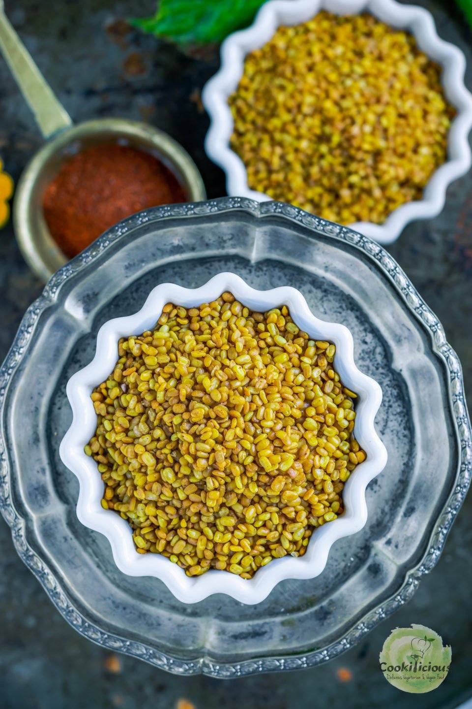 a bowl of Crunchy Moong Dal placed over a plate
