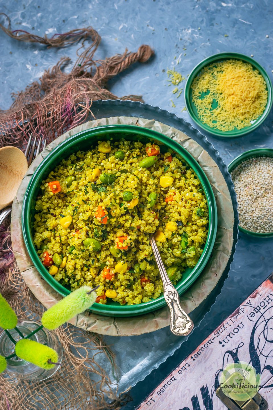 Vegetable Quinoa Upma in a bowl with a spoon in it