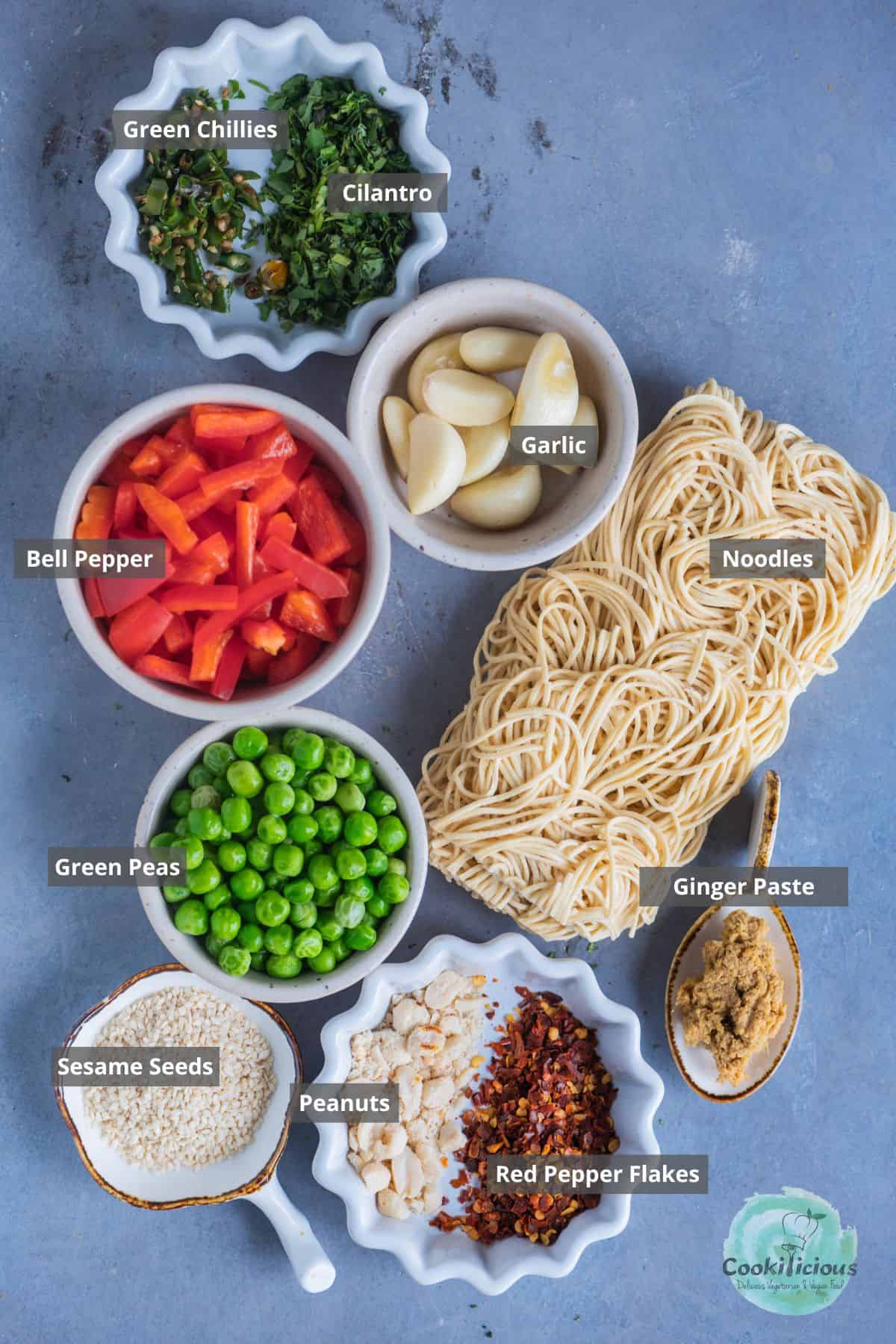 all ingredients needed to make Vegan Chili Garlic Noodles placed on a table with labels on them.