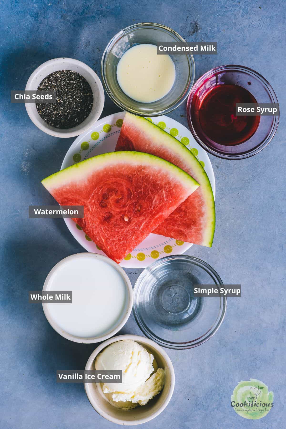 All the ingredients needed to make non alcoholic watermelon juice placed on a table with labels on them.
