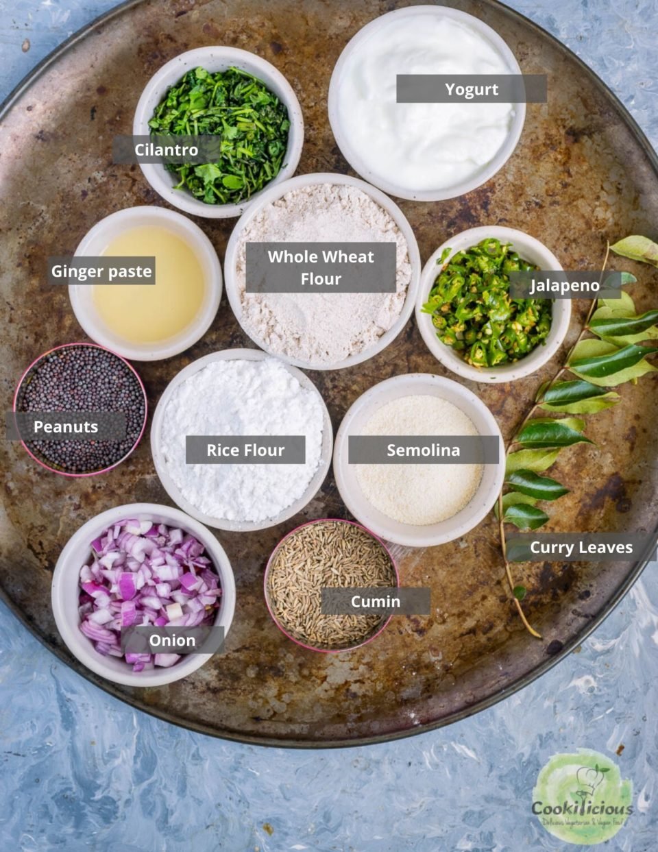 all the ingredients needed to make Wheat Dosa | Instant Wheat Rava Dosa placed in a tray with labels on them