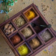 Indian masala dabba with all dry spice mixes in it
