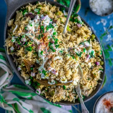 a platter of Potato Rice With Mint | Instant Pot Aloo Pudina Pulao with 2 spoons in it