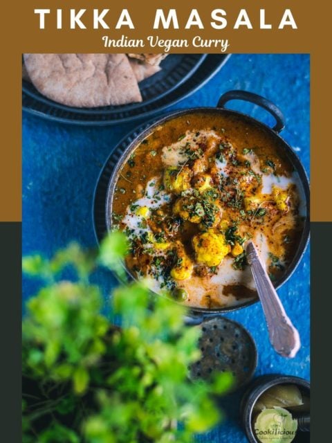 Cauliflower Tikka Masala - Easy Vegan Curry served in a small kadai with a spoon in it and text at the top