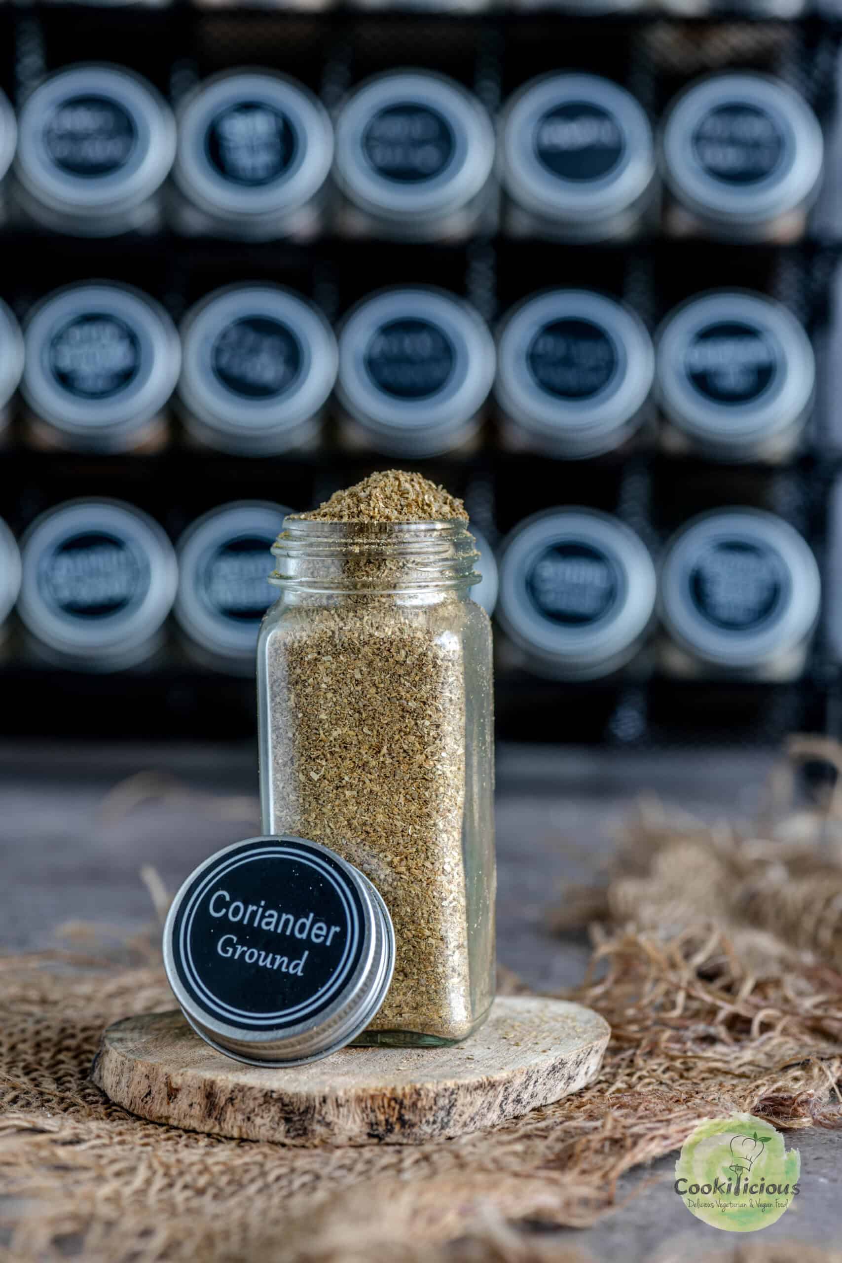 Coriander powder stored in a small glass jar.