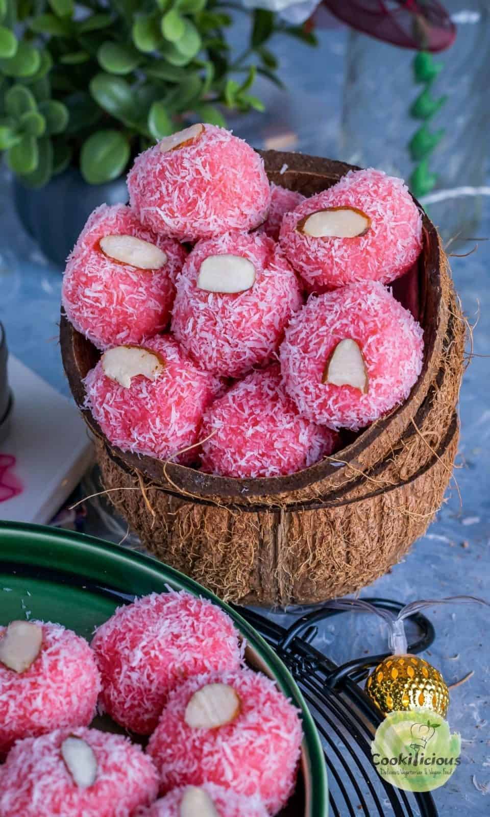 coconut shells filled with Instant Rose flavored Coconut Ladoo