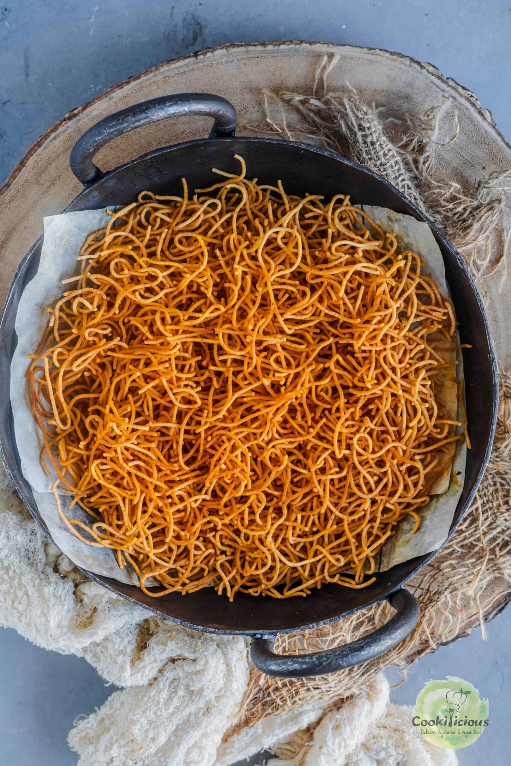 Masala Sev served in a round vessel..