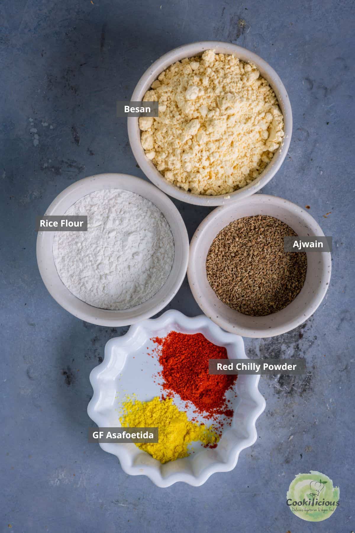 all ingredients needed to make Indian sev recipe placed on a table with labels on them.