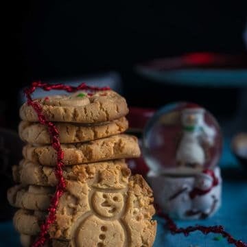 eggless Indian cookies stacked one on top of the other