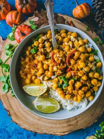 a round bowl filled with Instant Pot Butternut Squash Chickpea vegan Thai Curry