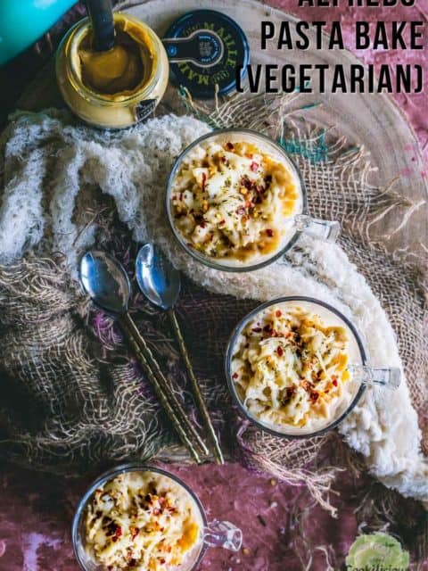 3 Vegetarian Alfredo Cheesy Mustard Mug Bakes with a jar of Maille Mustard on the side and text at the top right