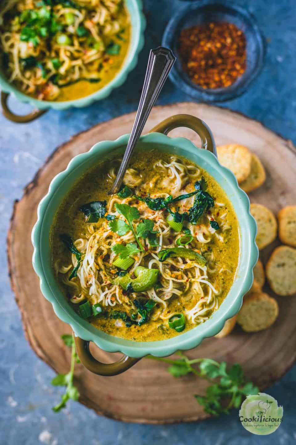 Vegan Thai Curry Noodles Soup served in a round bowl