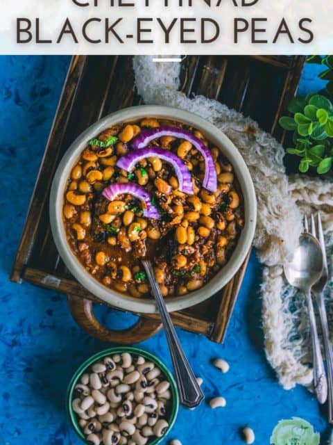 Chettinad Black Eyed Peas Curry served in a round bowl with a spoon in it and text at the top