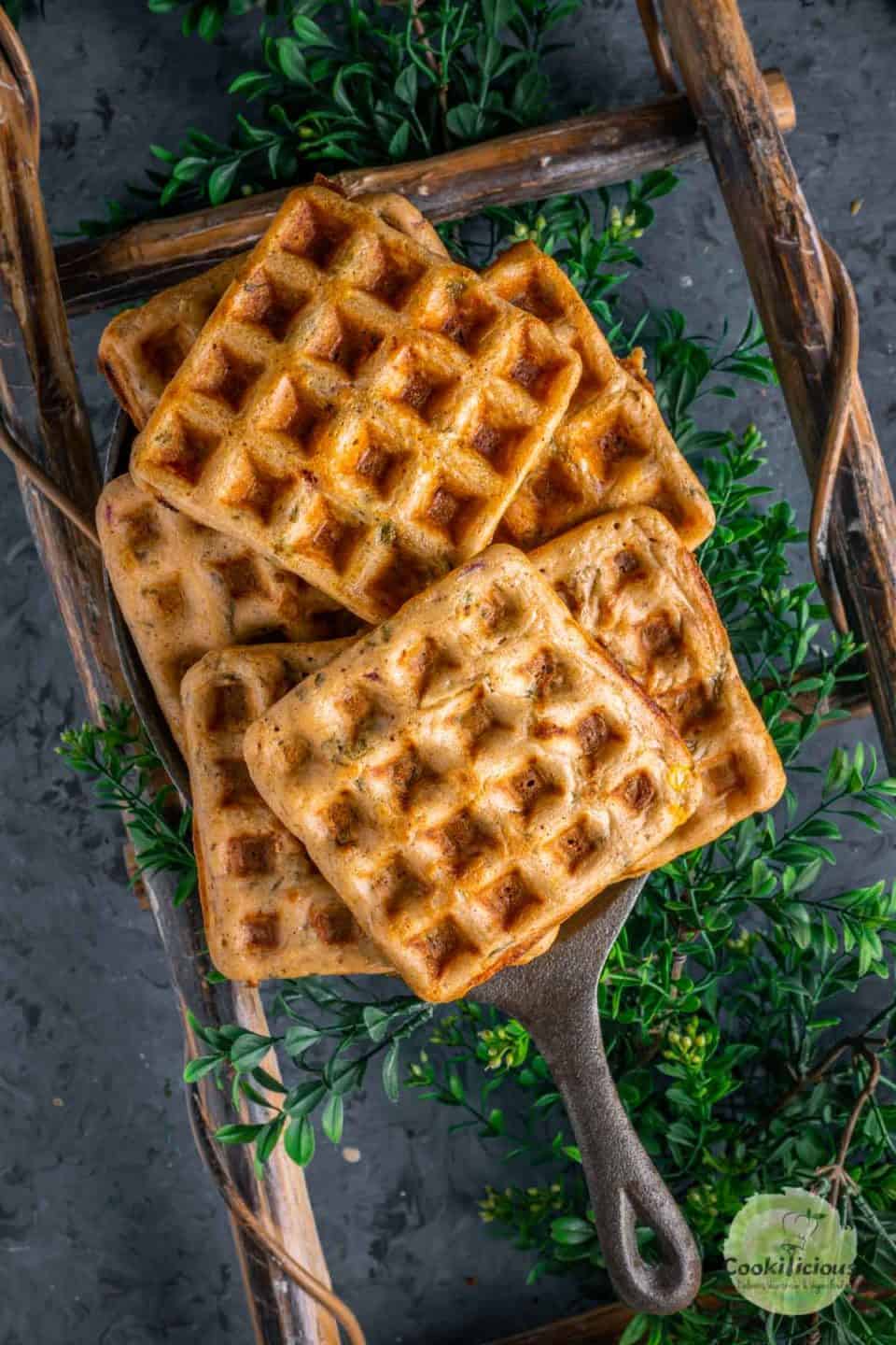 a couple of Vegan Savory Dosa Waffles served in a tray