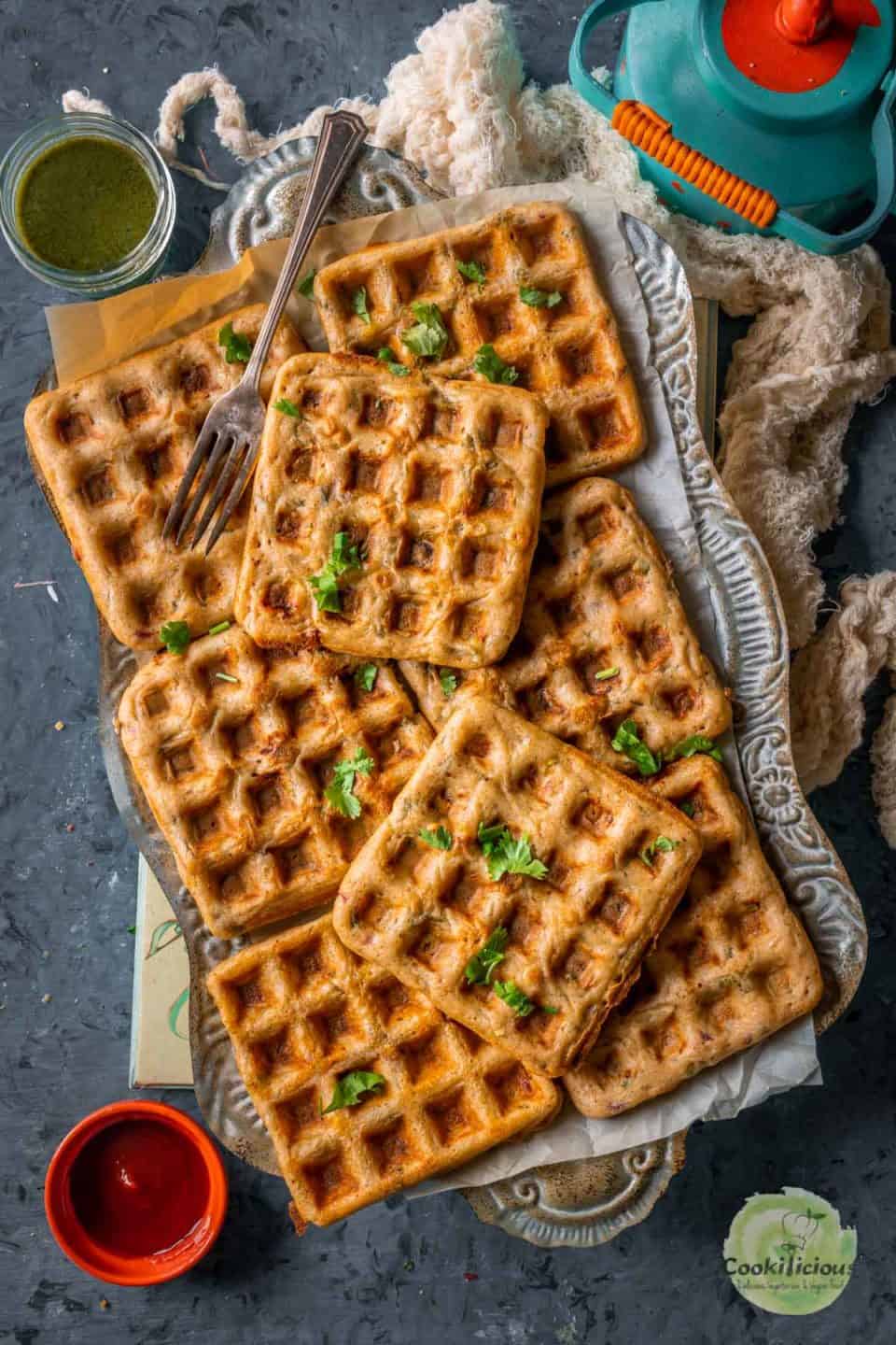 a rectangular tray filled with Vegan Savory Dosa Waffles