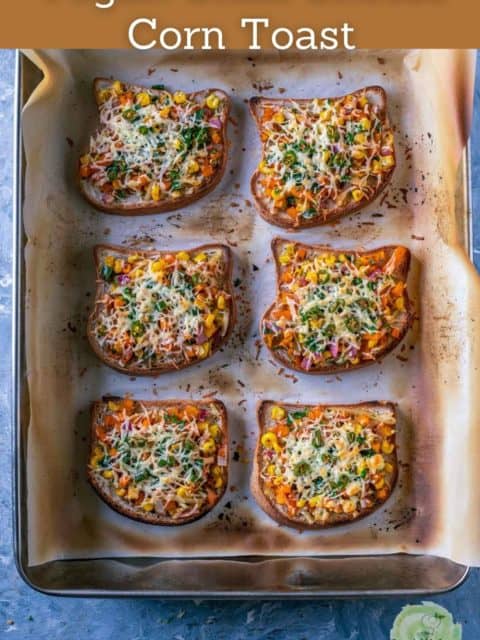 6 Vegan Chilli Cheese Corn Toasts freshly out of the oven and in a baking tray and text at the top