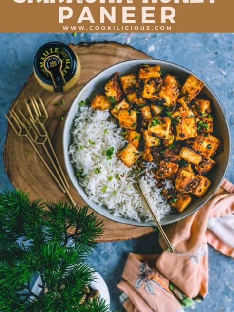 Honey Sriracha Tossed Paneer served in a plate with rice and text at the top