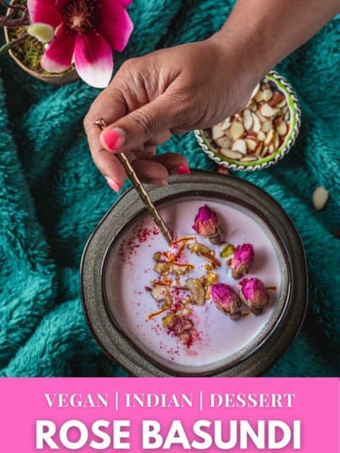 one hand digging into a bowl of Vegan Rose Basundi with a spoon and text at the bottom