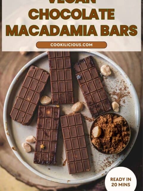 Pinterest pin for vegan chocolate macadamia bars showing sliced pieces on a plate with macadamia nuts and cacao powder.