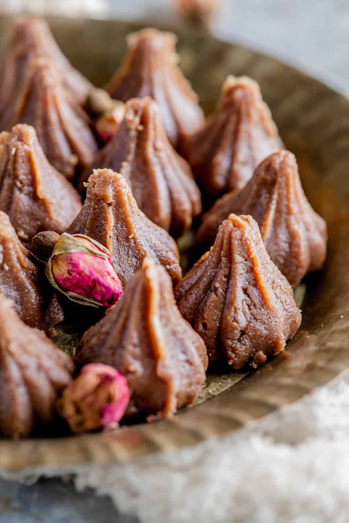 Chocolate modaks placed on a serving platter.