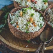 South Indian Coconut Rice served in a coconut shell