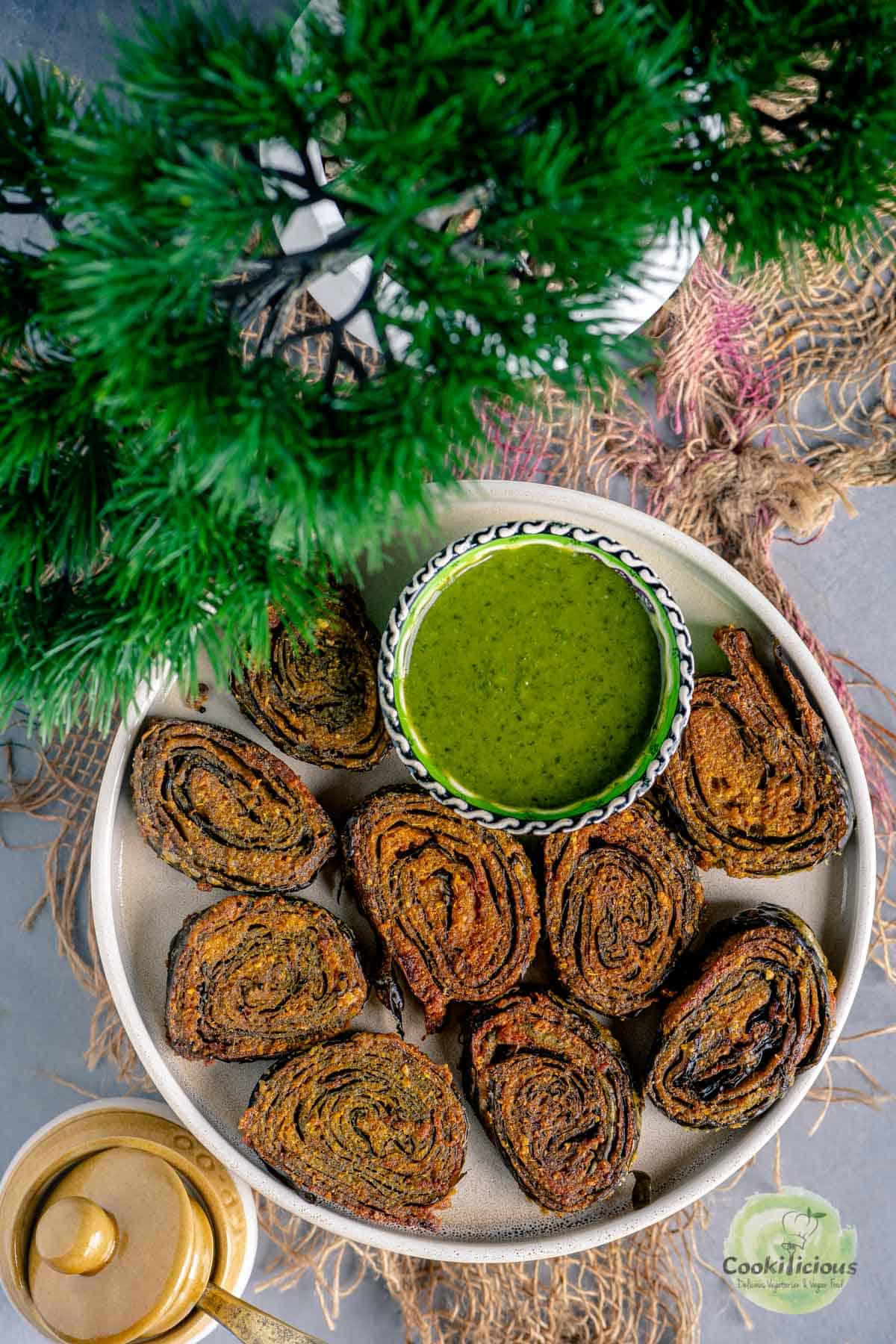 Colocasia spirals served in a platter with green chutney