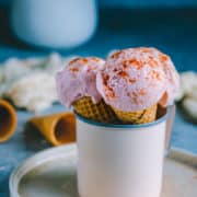 3 cones of guava ice cream placed in a mug