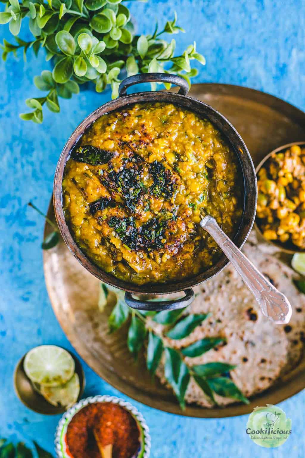Methi Dal served in a small kadai with a spoon in it