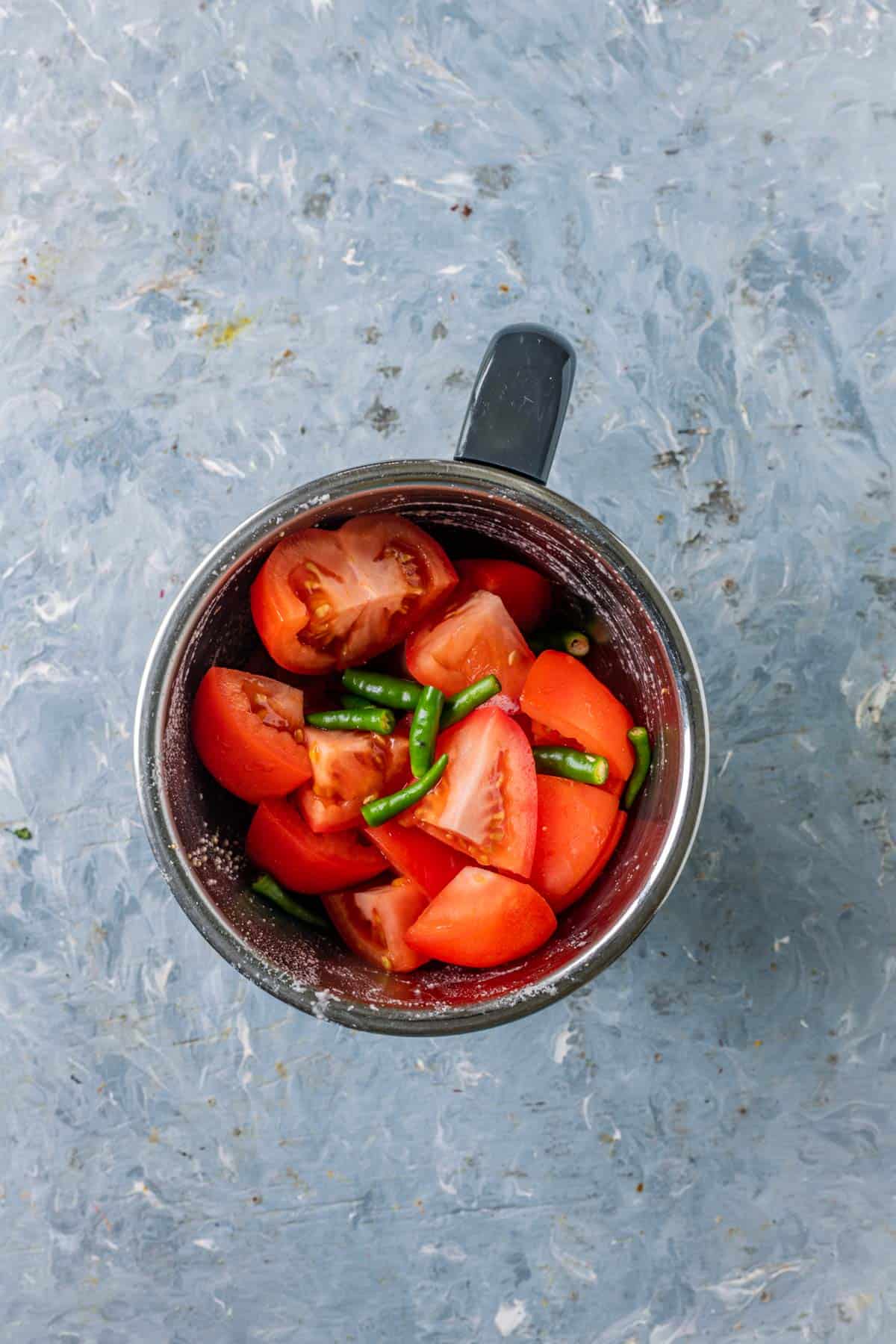 Fresh tomatoes and green chilies blended into a smooth puree.