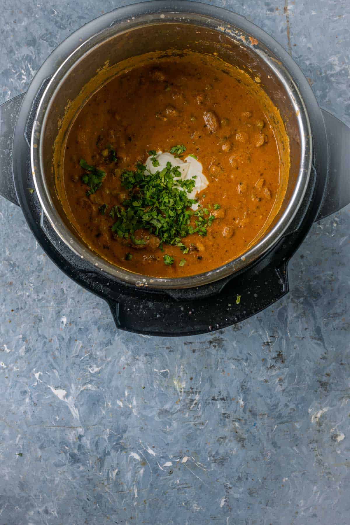 Finished mushroom masala garnished with cilantro, ready to serve.