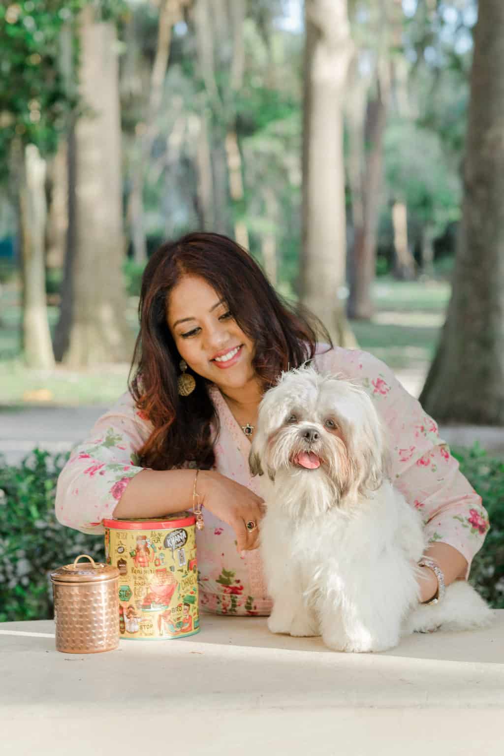 Priya with her dog Joey.