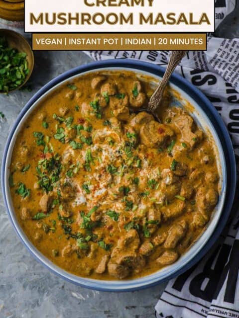 Steaming hot mushroom curry in a rustic serving bowl, ready to eat and text at the top and bottom.