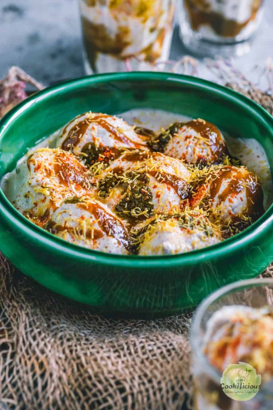 Dahi Vada served in a round bowl
