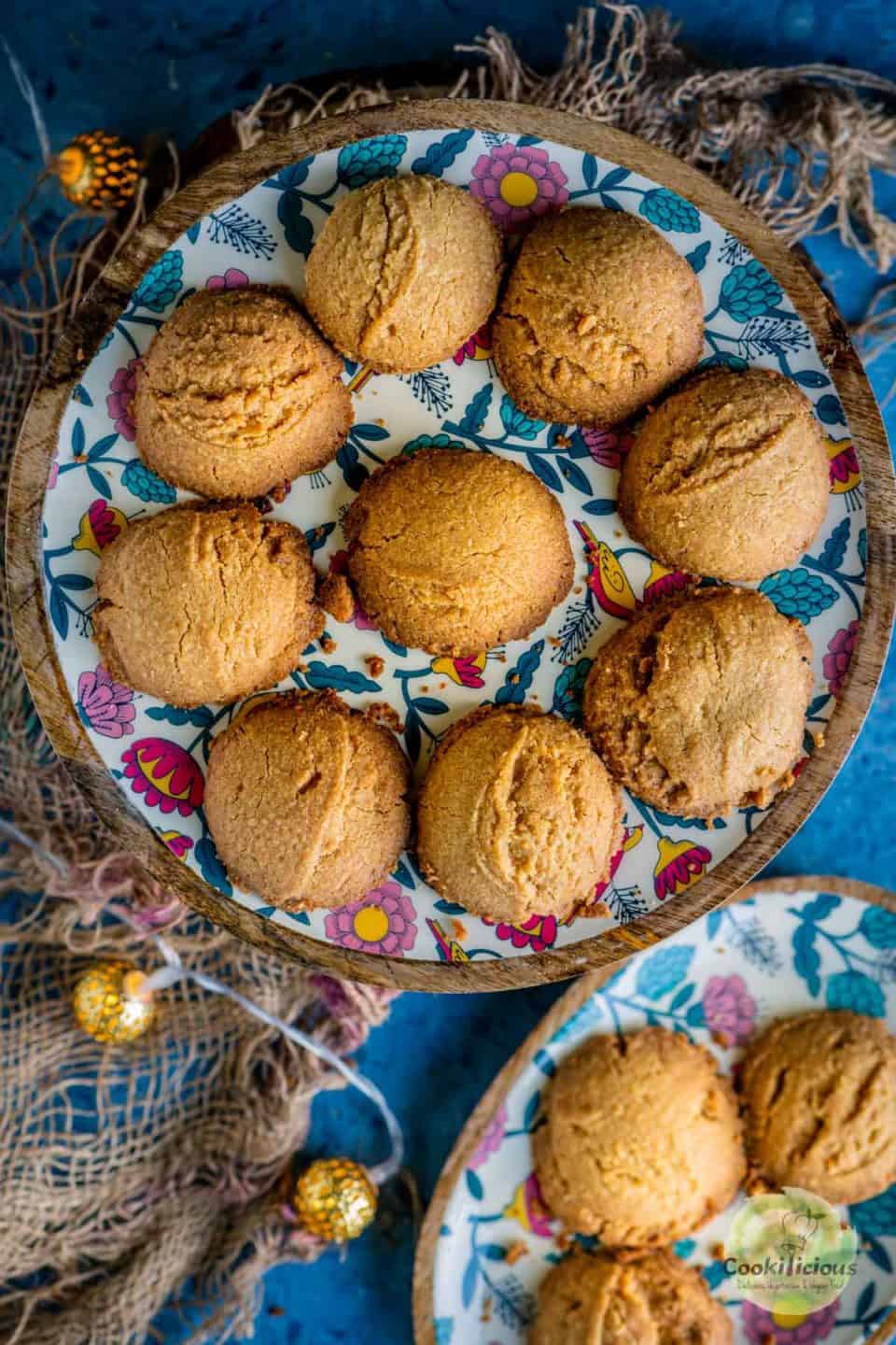 a round tray filled with Whole Wheat Ghee Cookies