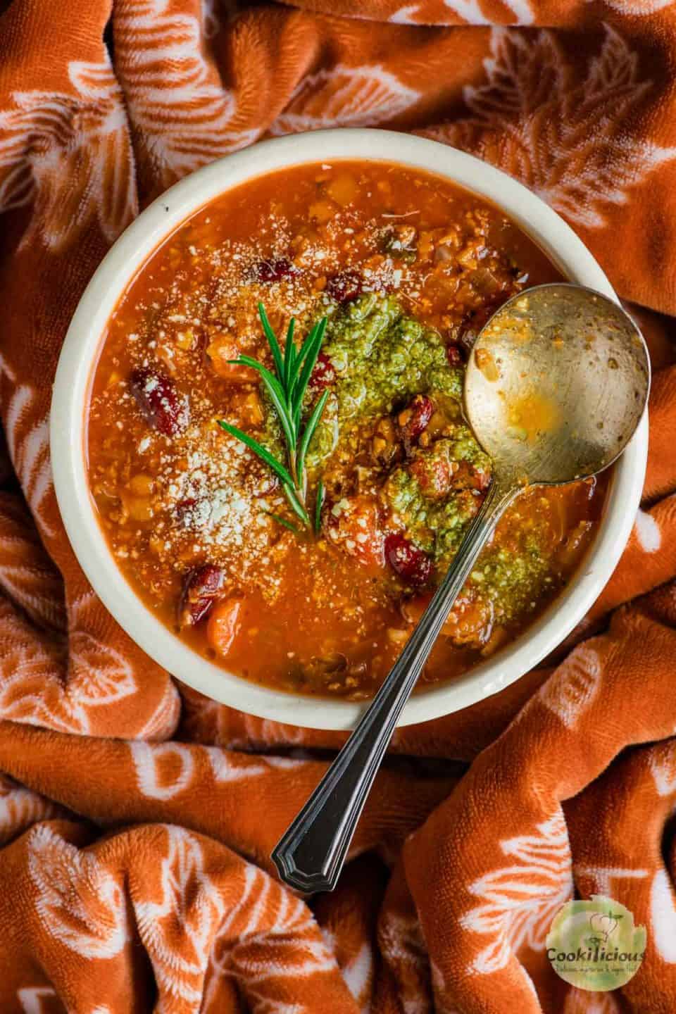 Italian chili served in a bowl with a spoon resting on top